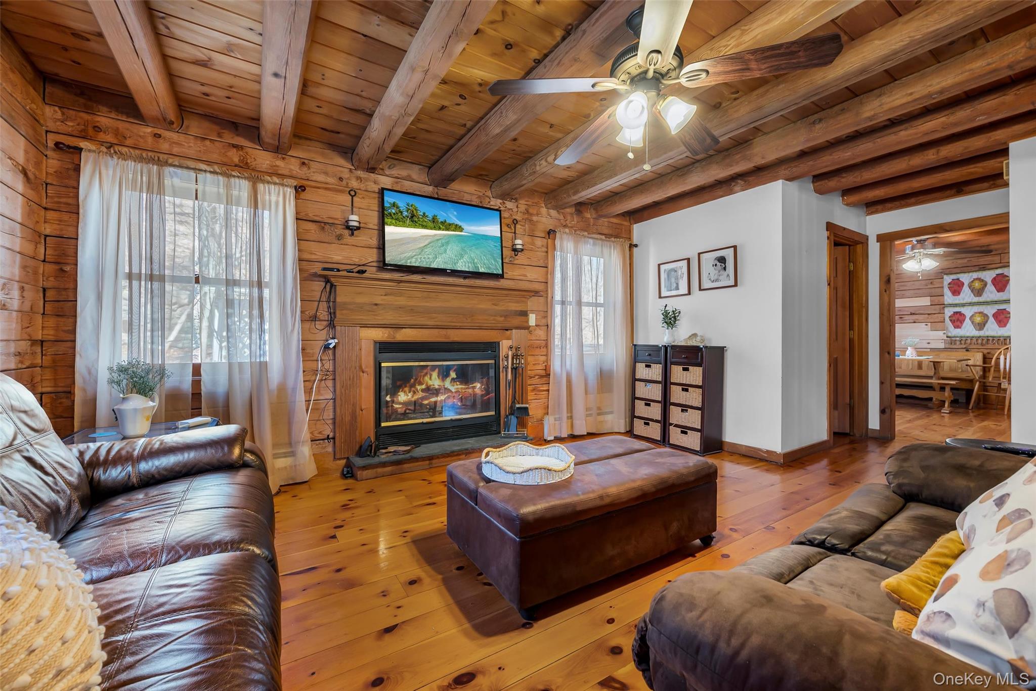 1085 County Rte 17 Montgomery, NY 12549 - Photo 8 of 50 a living room with furniture and a fireplace