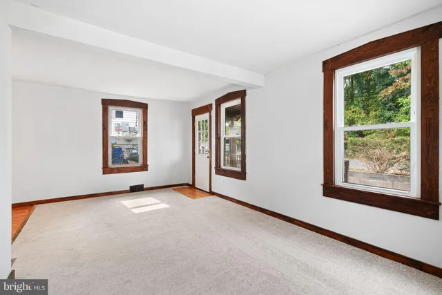 an empty room with windows