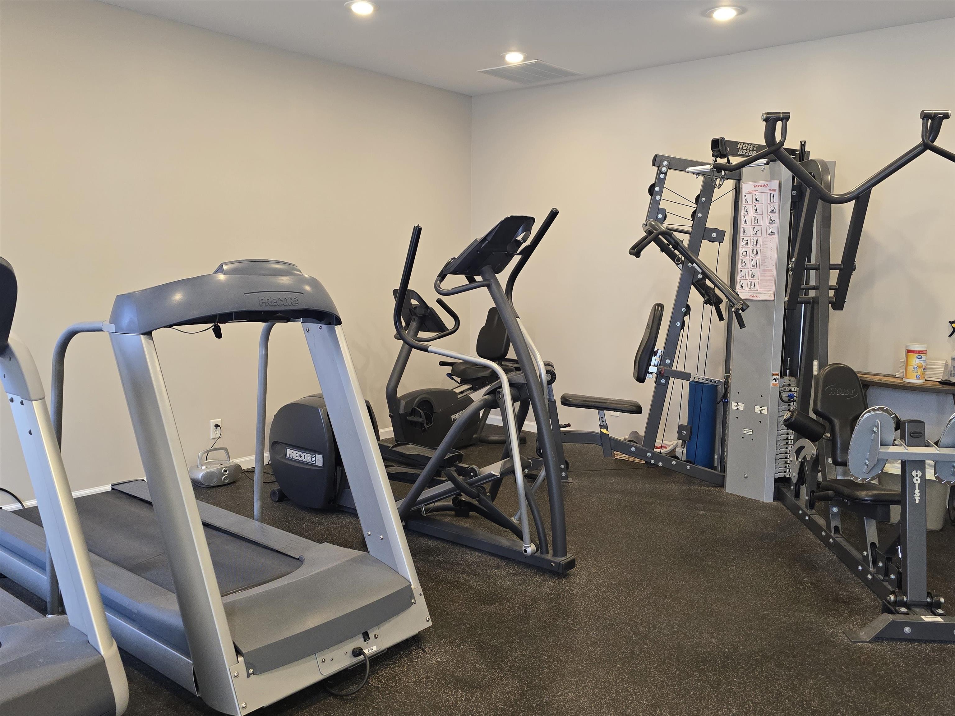 7593 Magnolia Trail Cherry Valley, IL 61016 - Photo 19 of 32 a view of a room with gym equipment