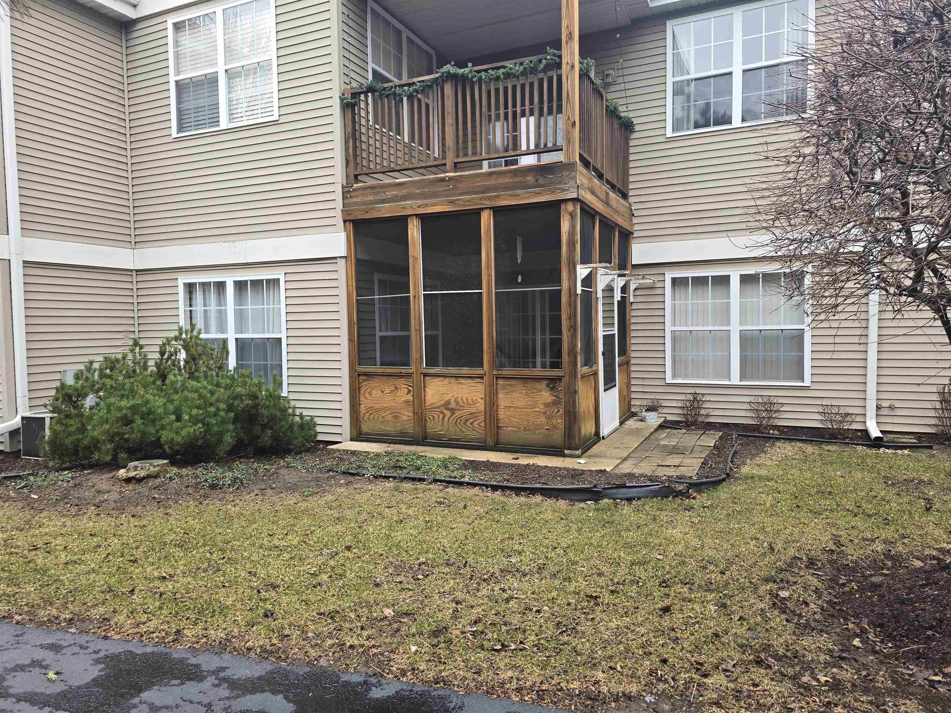 7593 Magnolia Trail Cherry Valley, IL 61016 - Photo 29 of 32 a front view of a house with a yard