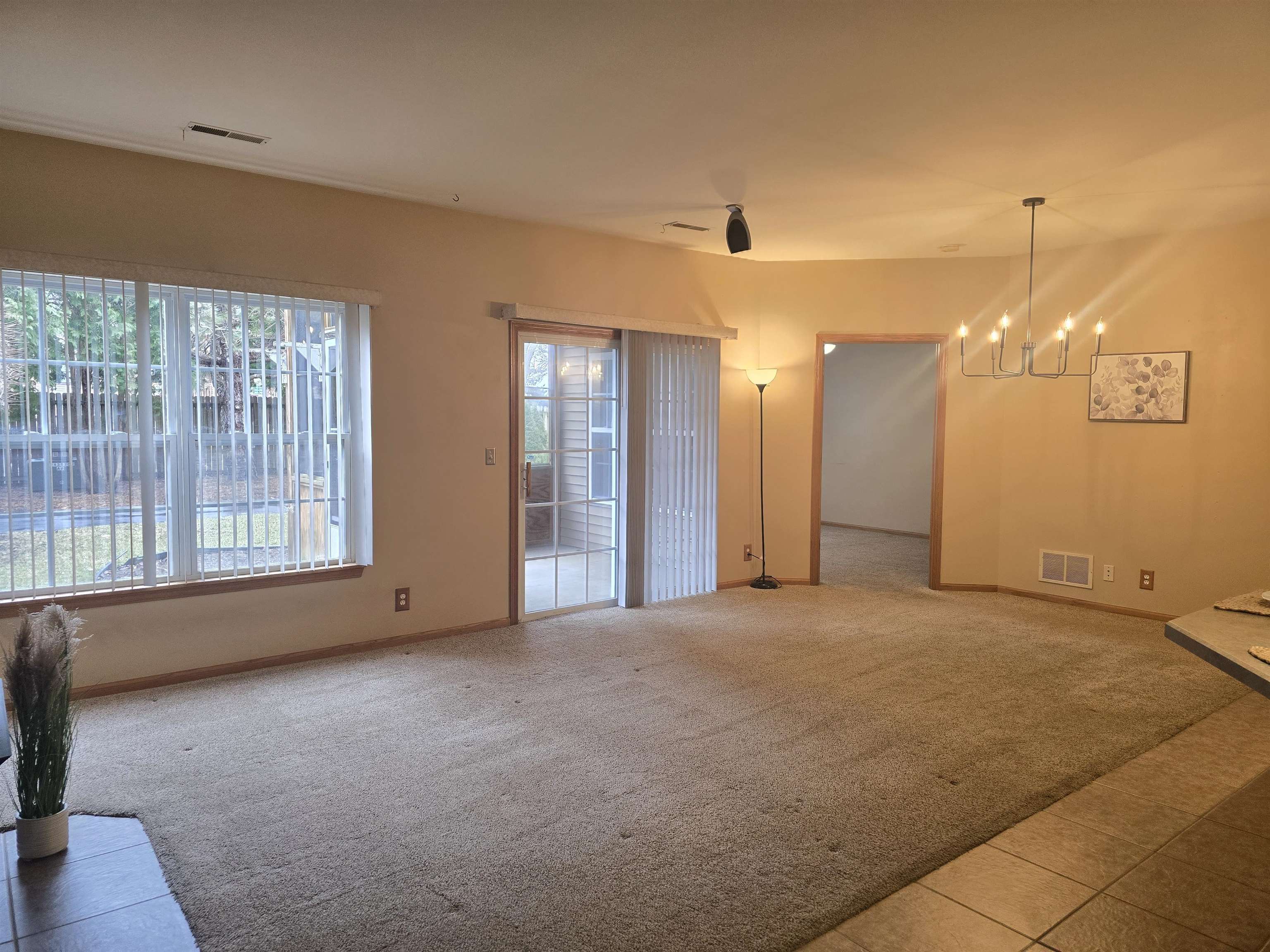 7593 Magnolia Trail Cherry Valley, IL 61016 - Photo 4 of 32 a view of an empty room with a window
