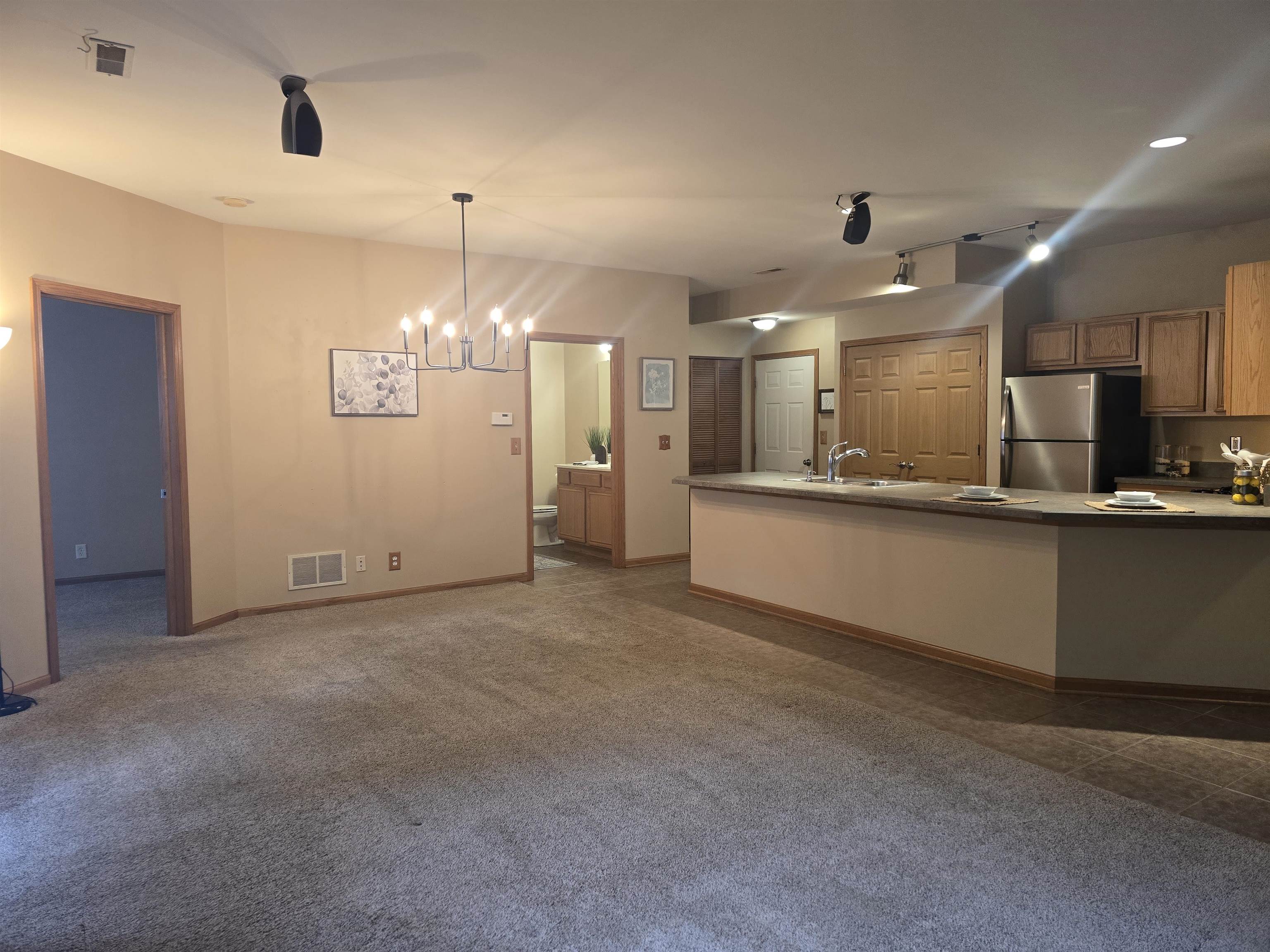 7593 Magnolia Trail Cherry Valley, IL 61016 - Photo 5 of 32 a view of a kitchen with a sink and cabinet area