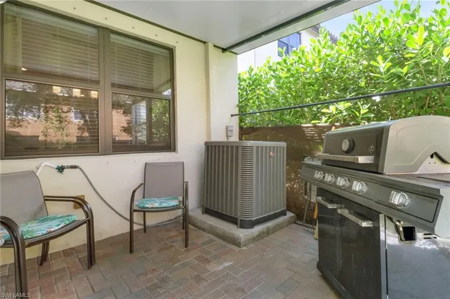 a view of a chairs and table in the room