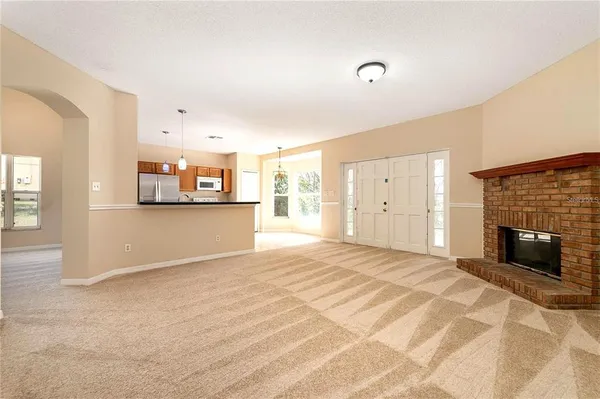 a view of a livingroom with a fireplace