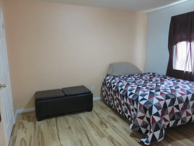 a view of front door of house and yard