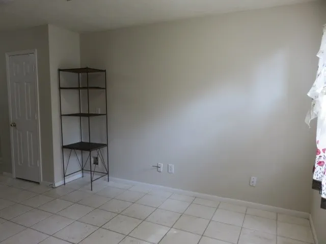 a view of a back yard of the house