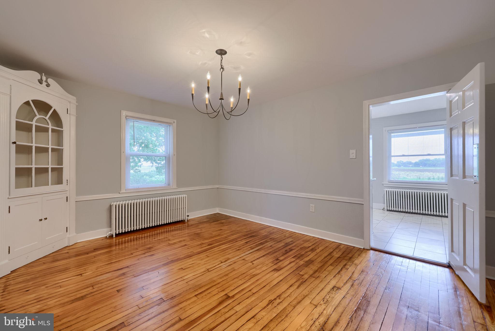 145 Weaver Road Lancaster, PA 17603 - Photo 42 of 87 wooden floor in an empty room with a window