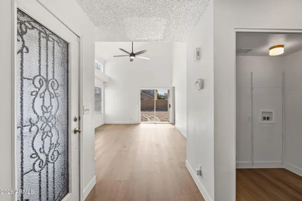 a view of entryway with wooden floor