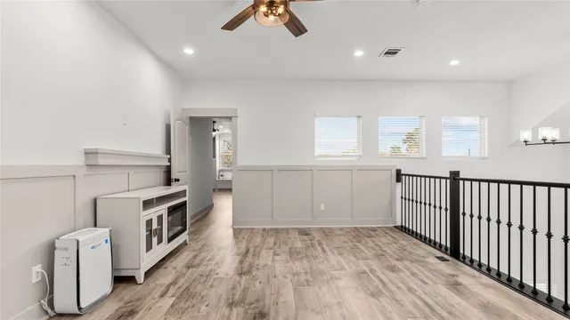 a view of a kitchen with furniture and a window