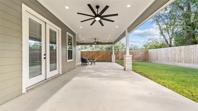 a view of a porch with a table and a chairs