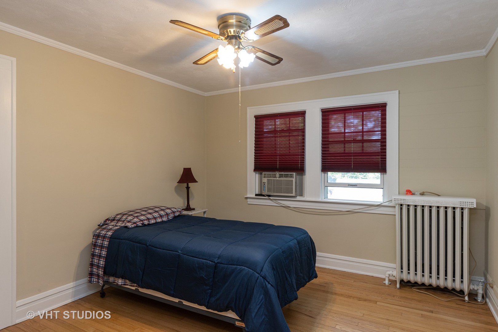136 Barrypoint Road Riverside, IL 60546 - Photo 11 of 19 a bedroom with a bed and a window