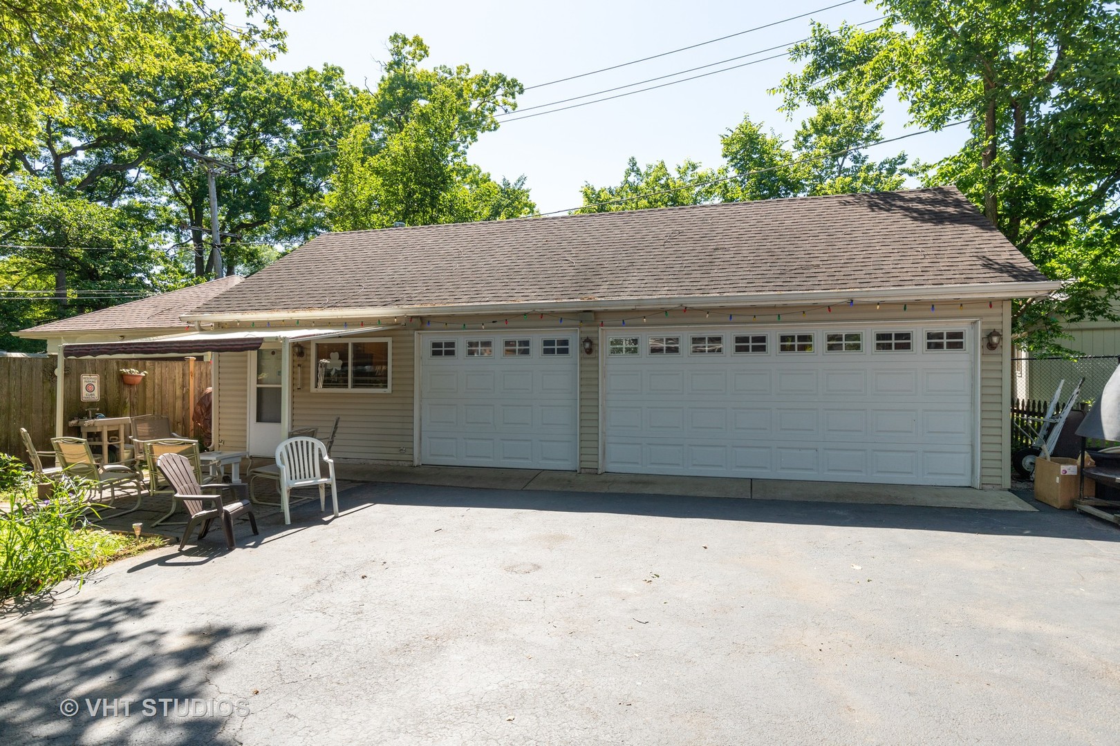 136 Barrypoint Road Riverside, IL 60546 - Photo 18 of 19 a backyard of a house with yard and seating space
