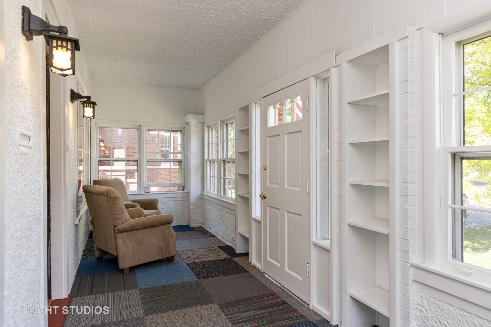136 Barrypoint Road Riverside, IL 60546 - Photo 9 of 19 a living room with furniture and a large window