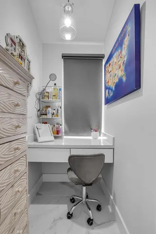 a bath room with a toilet a sink and a bathtub