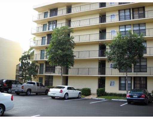 3 Royal Palm Way Boca Raton, FL 33432 - Photo 1 of 14 a car parked in front of a building