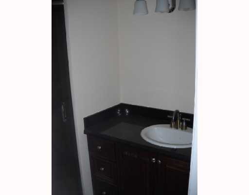 3 Royal Palm Way Boca Raton, FL 33432 - Photo 12 of 14 a sink and a mirror