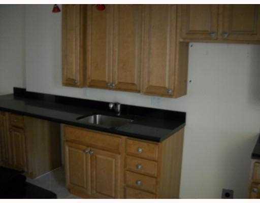 3 Royal Palm Way Boca Raton, FL 33432 - Photo 8 of 14 a kitchen with a sink and cabinets