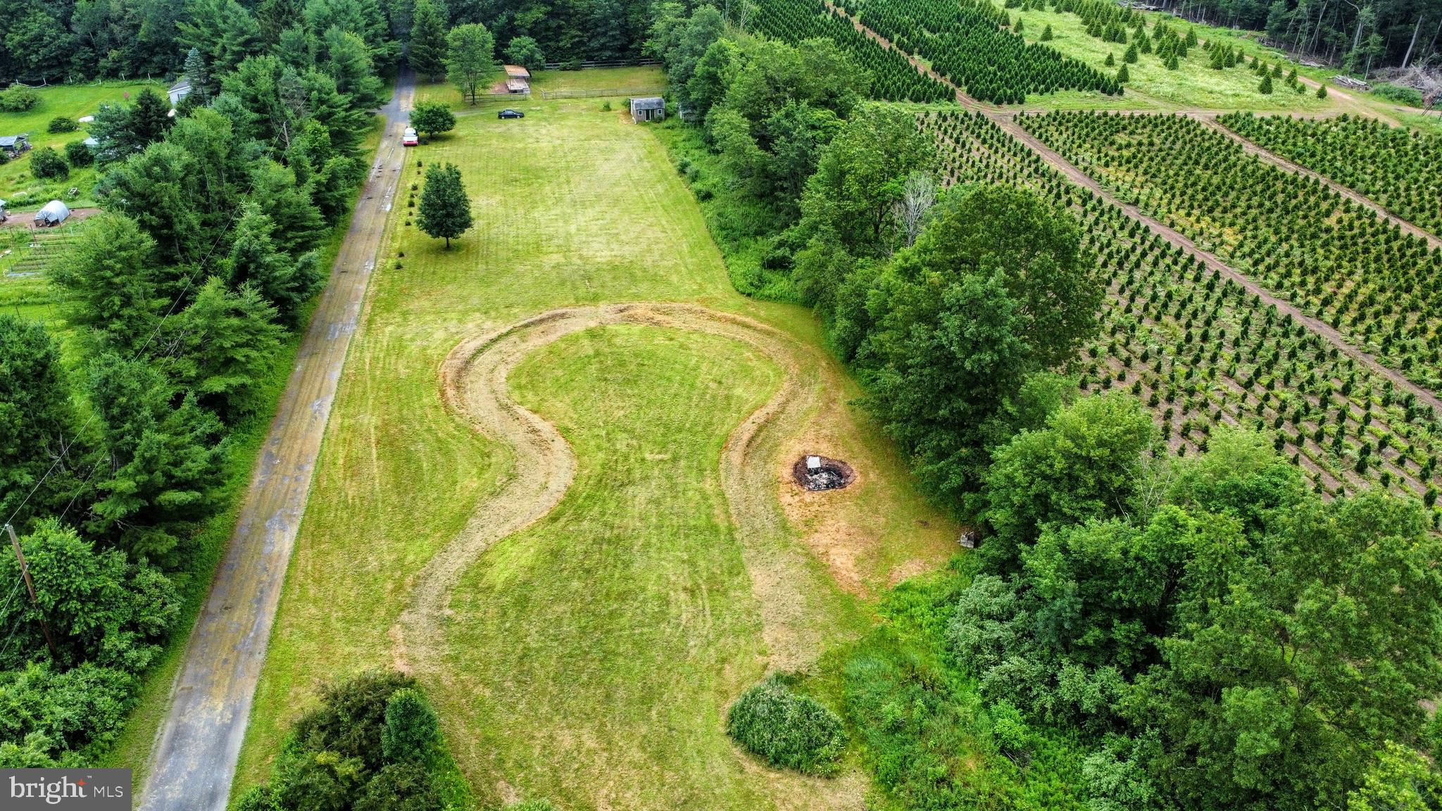 223 Brink Road Saylorsburg, PA 18353 - Photo 3 of 19 an aerial view of residential houses with outdoor space and trees all around