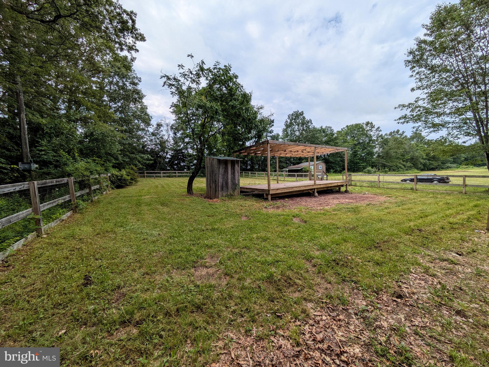 223 Brink Road Saylorsburg, PA 18353 - Photo 7 of 19 a view of a green field with trees in the background