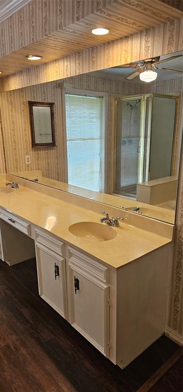 2 Woodfern Lane Haughton, LA 71037 - Photo 14 of 33 a bathroom with a sink and a mirror