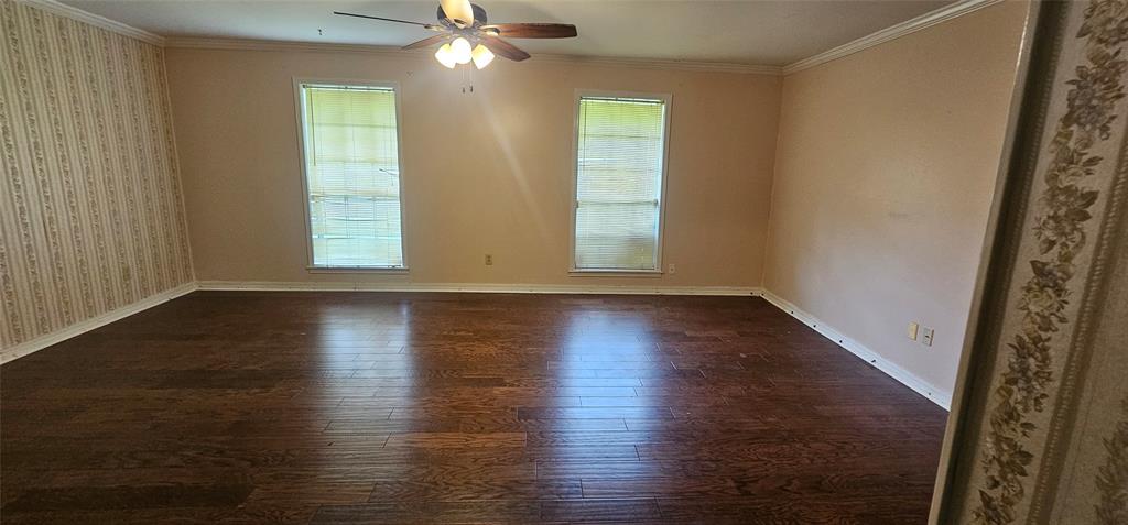2 Woodfern Lane Haughton, LA 71037 - Photo 18 of 33 wooden floor in an empty room with a window