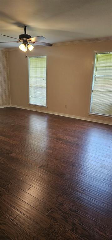 2 Woodfern Lane Haughton, LA 71037 - Photo 19 of 33 an empty room with wooden floor and windows