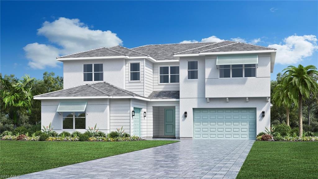 8558 Oceana Way Naples, FL 34114 - Photo 24 of 25 a front view of a house with a garden and yard