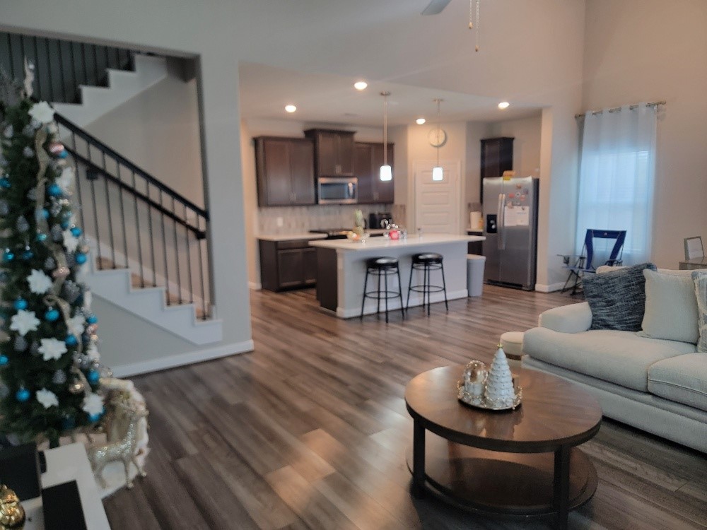 10803 Sugar Pne Lane Rosharon, TX 77583 - Photo 6 of 18 a living room with furniture and wooden floor
