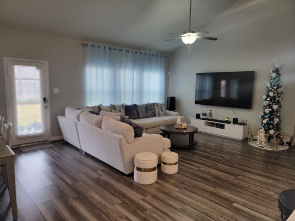 10803 Sugar Pne Lane Rosharon, TX 77583 - Photo 8 of 18 a living room with furniture and a flat screen tv