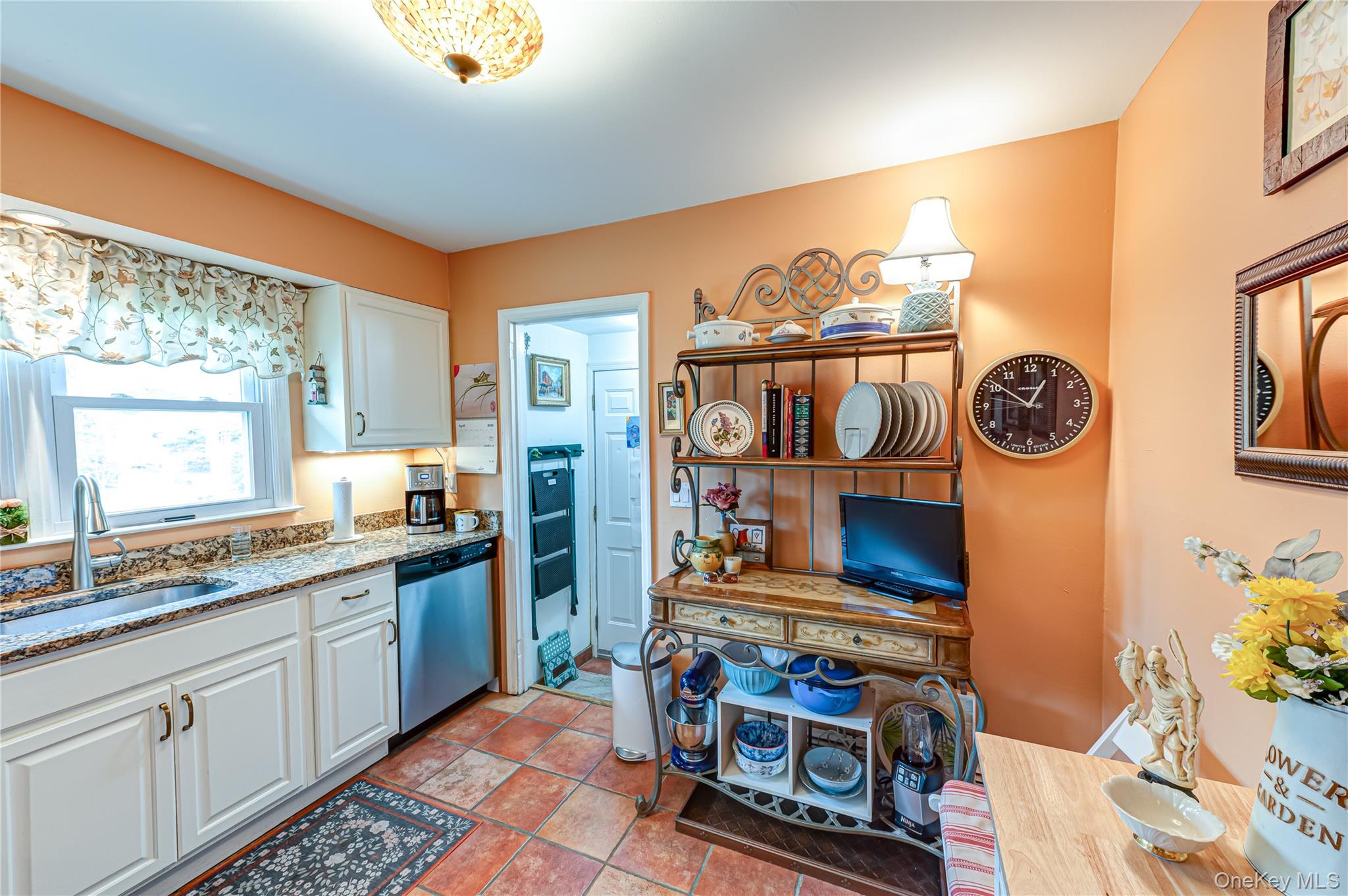 19 Harvard Road Shoreham, NY 11786 - Photo 11 of 30 terracotta floors, white wood cabinets, granite counters