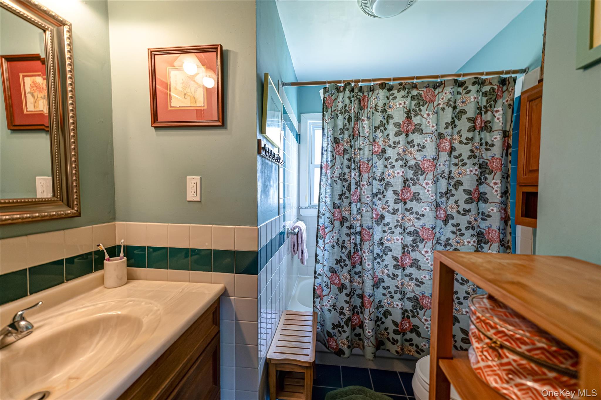19 Harvard Road Shoreham, NY 11786 - Photo 13 of 30 tiled main level bath with a tub & showeroversized vanity with a sink