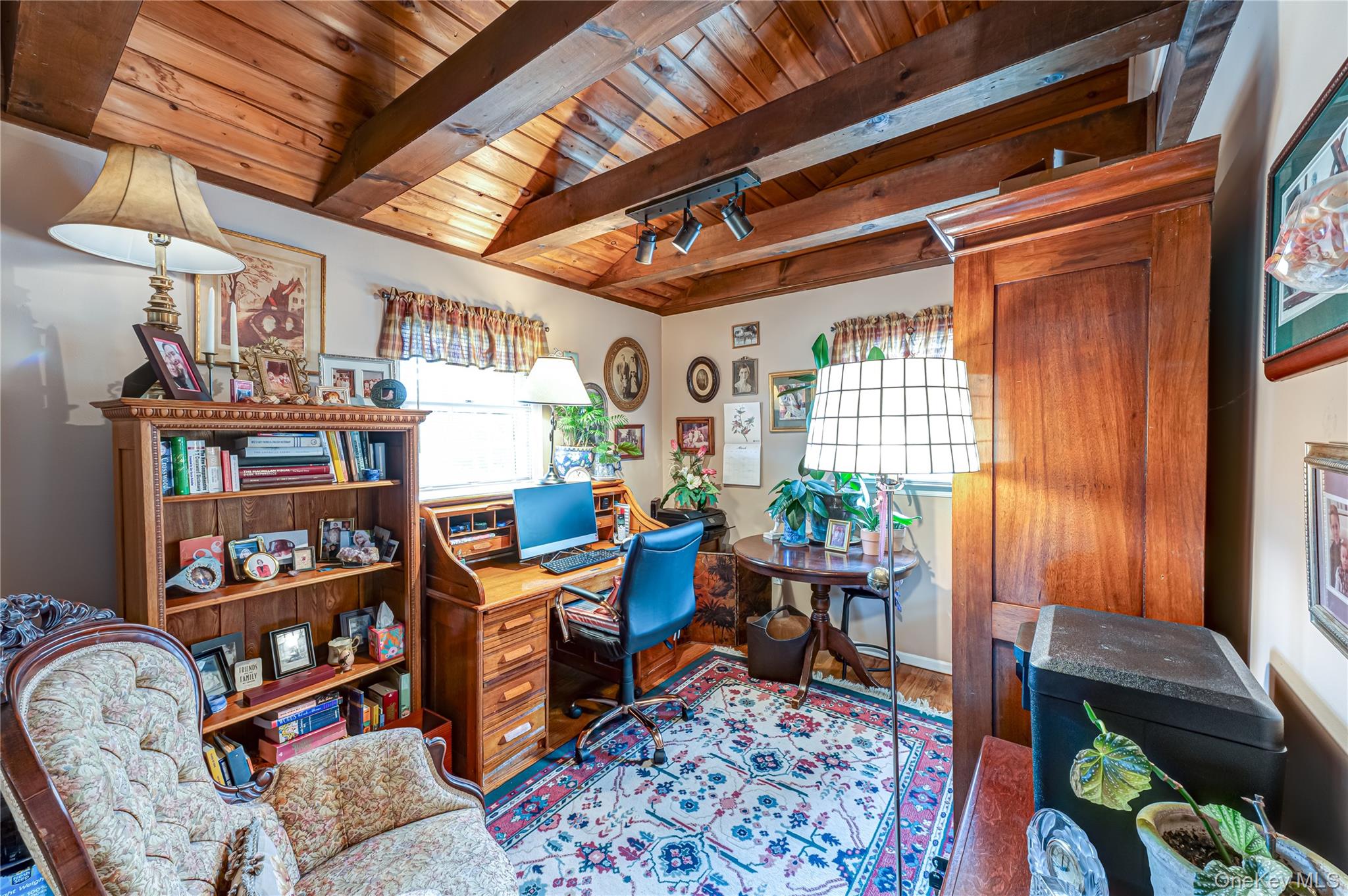 19 Harvard Road Shoreham, NY 11786 - Photo 14 of 30 on the main level bed room currently used as an art studio / office boasting a vaulted beamed ceiling