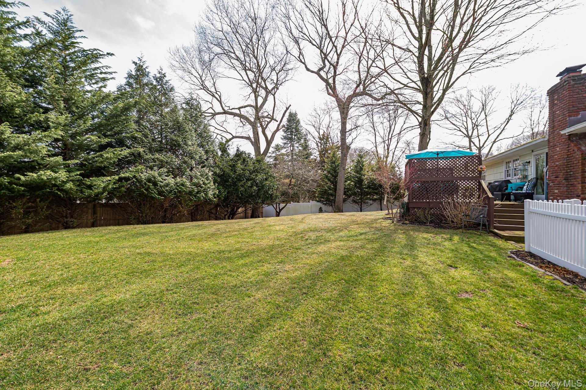 19 Harvard Road Shoreham, NY 11786 - Photo 26 of 30 mature lush landscape