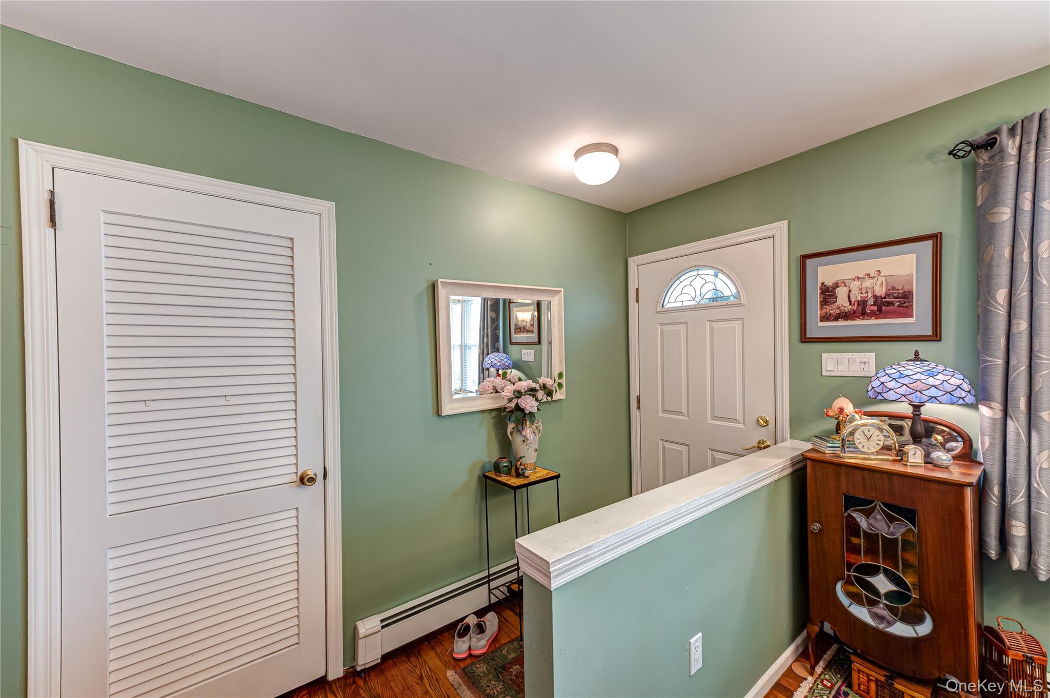 19 Harvard Road Shoreham, NY 11786 - Photo 4 of 30 the entry with a guest closet