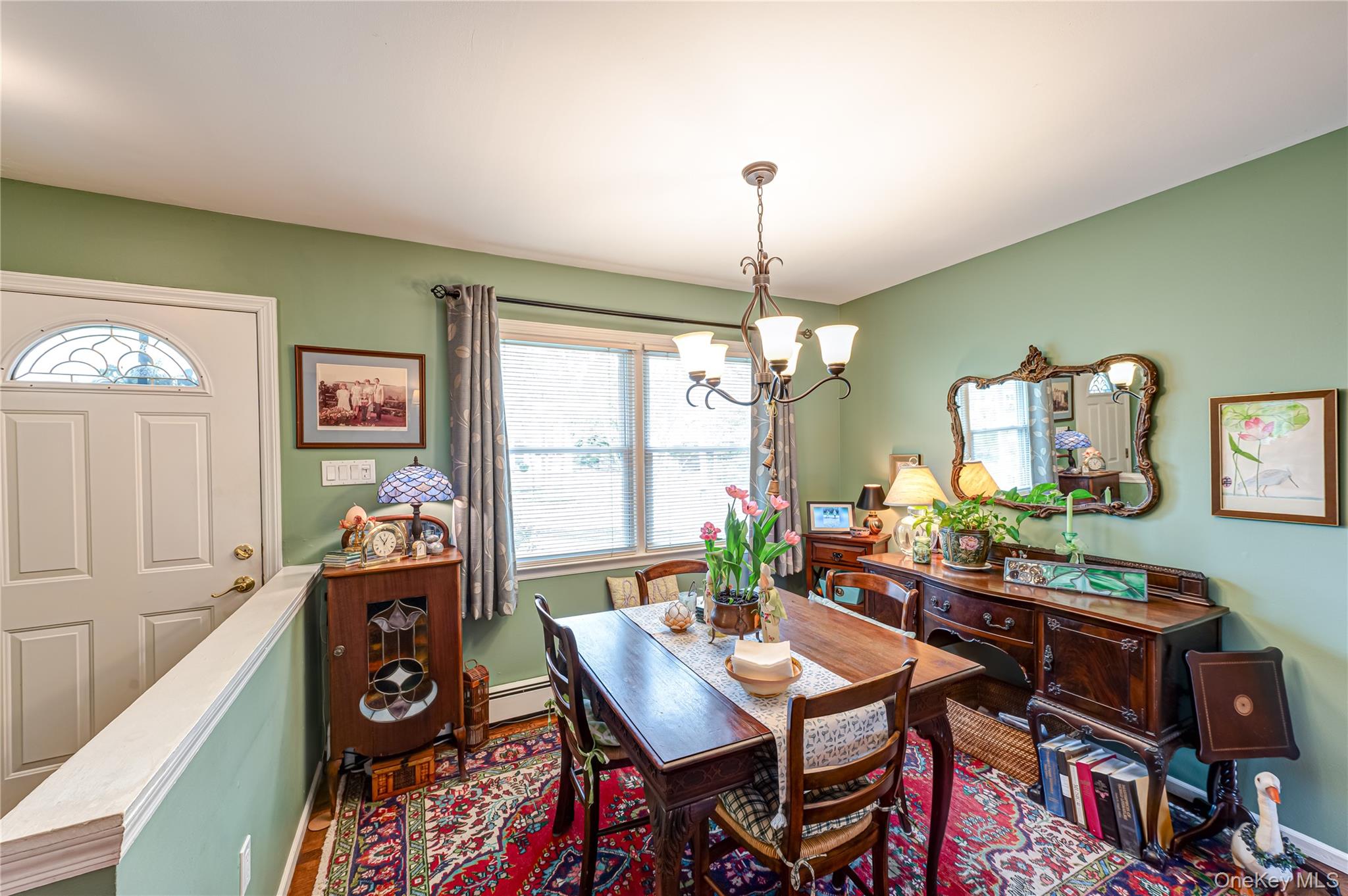 19 Harvard Road Shoreham, NY 11786 - Photo 5 of 30 hardwood floors, nice large window with a birds eye view who is on the driveway & behind the front door.
