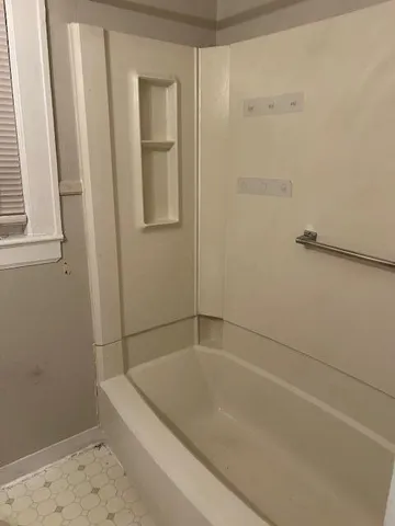 a bathroom with a bathtub