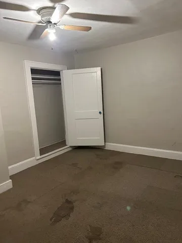 an empty room with closet