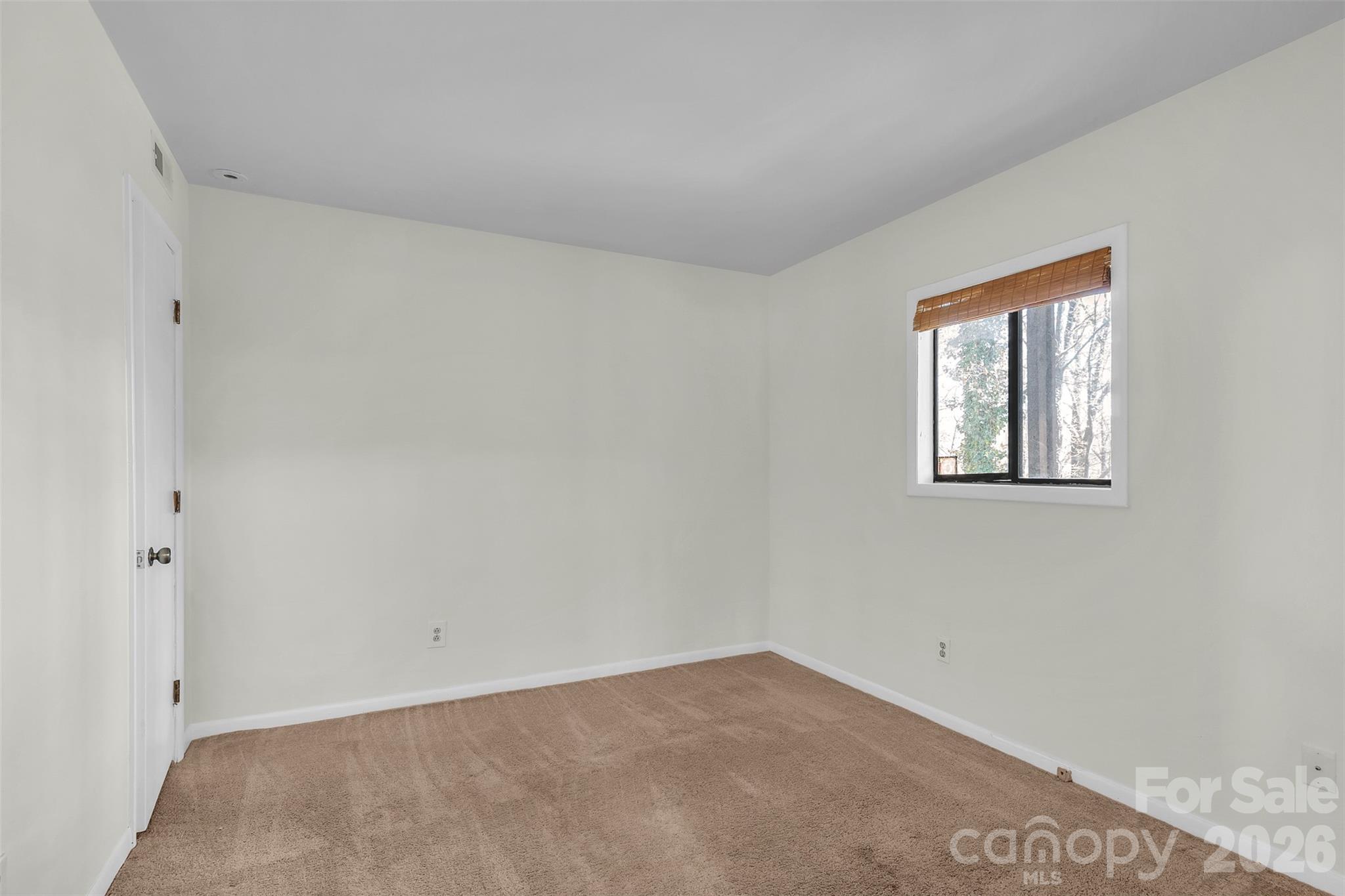 1121 Mai Kai Way Fort Mill, SC 29708 - Photo 15 of 35 an empty room with a window