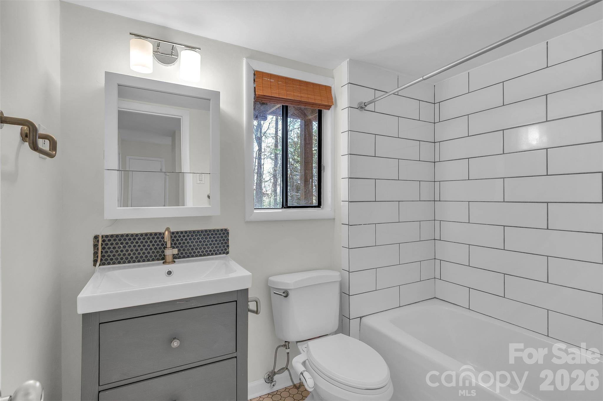 1121 Mai Kai Way Fort Mill, SC 29708 - Photo 16 of 35 a bathroom with a sink a toilet and shower