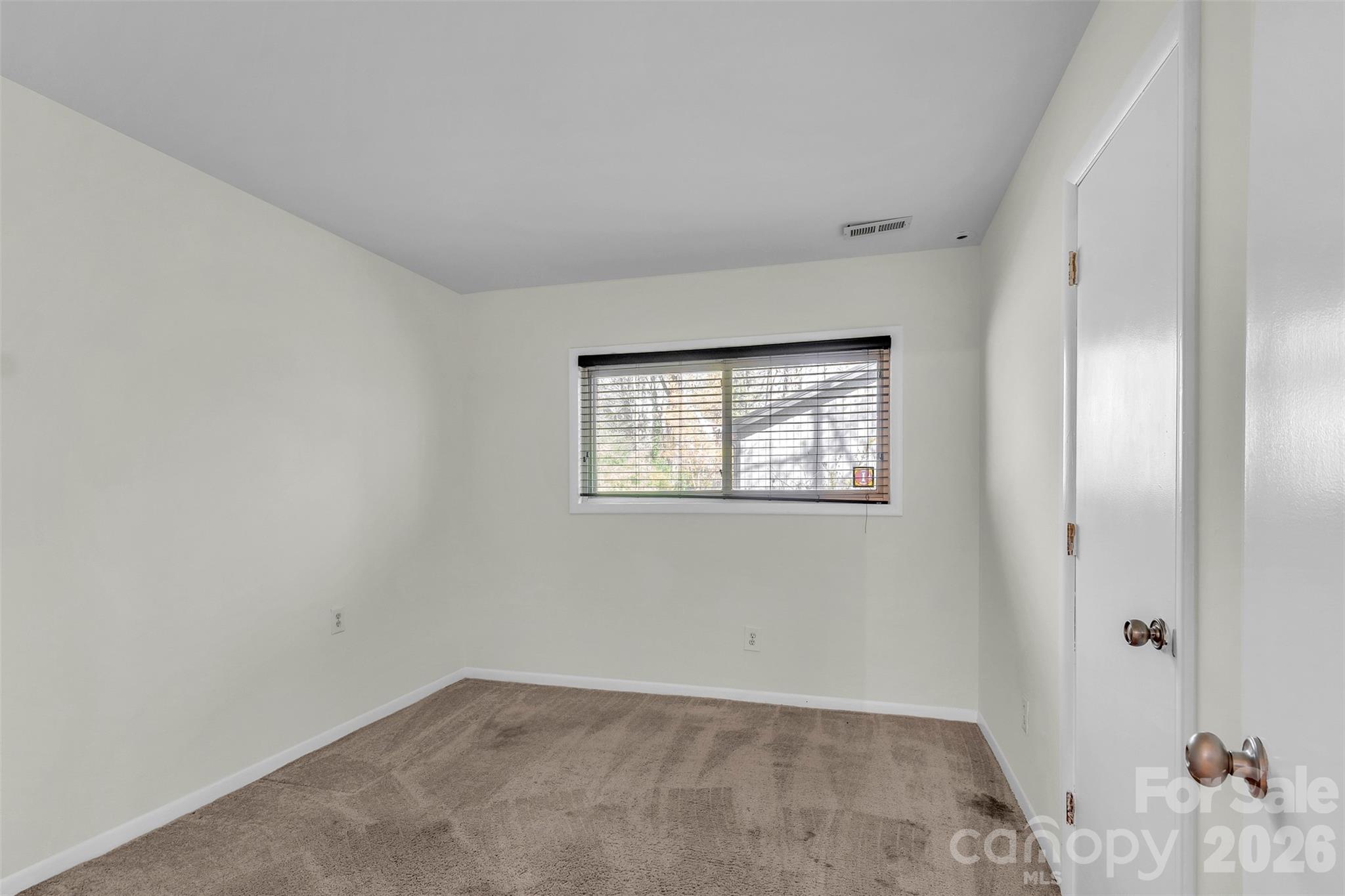 1121 Mai Kai Way Fort Mill, SC 29708 - Photo 18 of 35 a view of an empty room with a window
