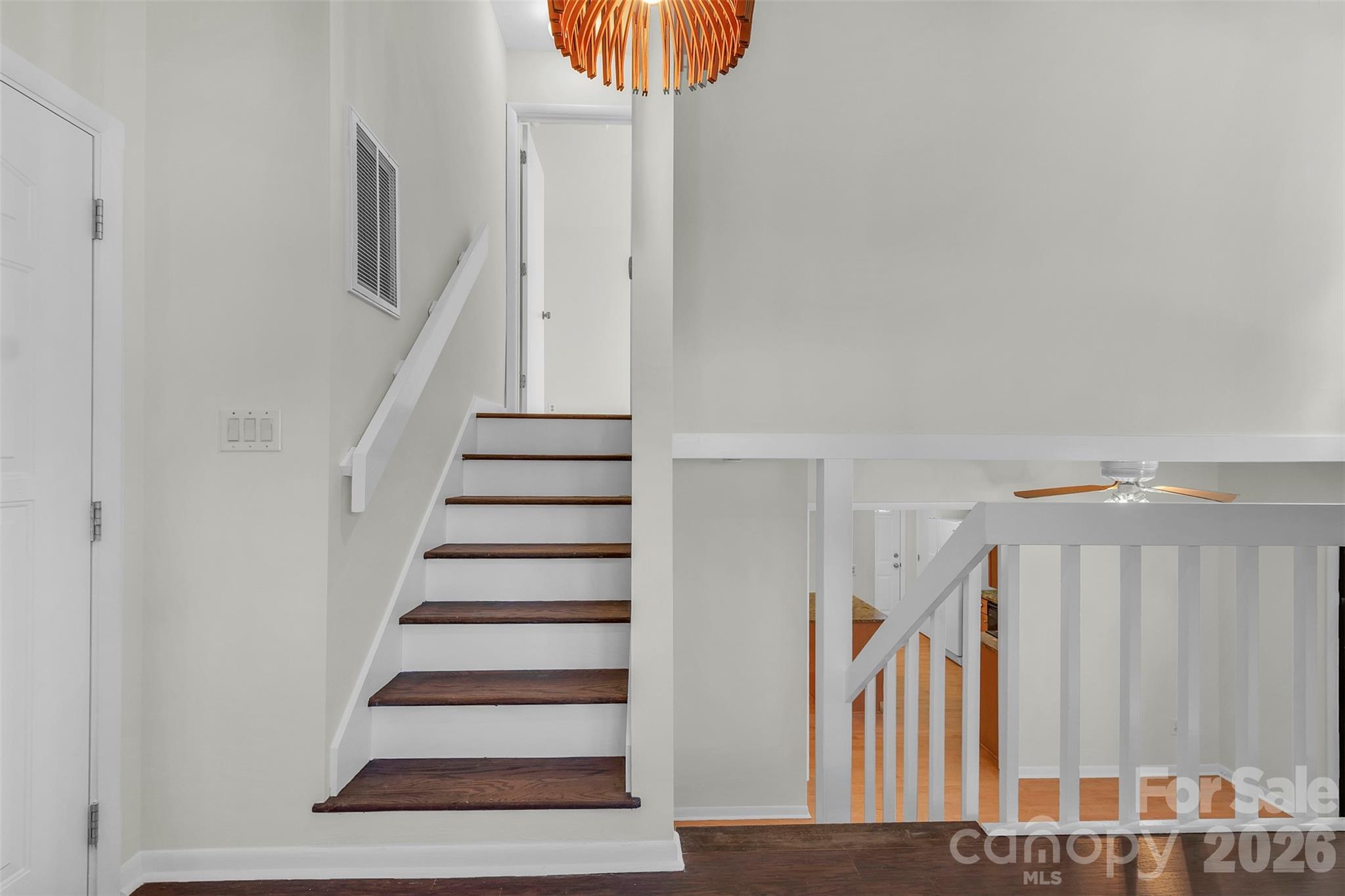 1121 Mai Kai Way Fort Mill, SC 29708 - Photo 19 of 35 a view of entryway with stairs and wooden floor
