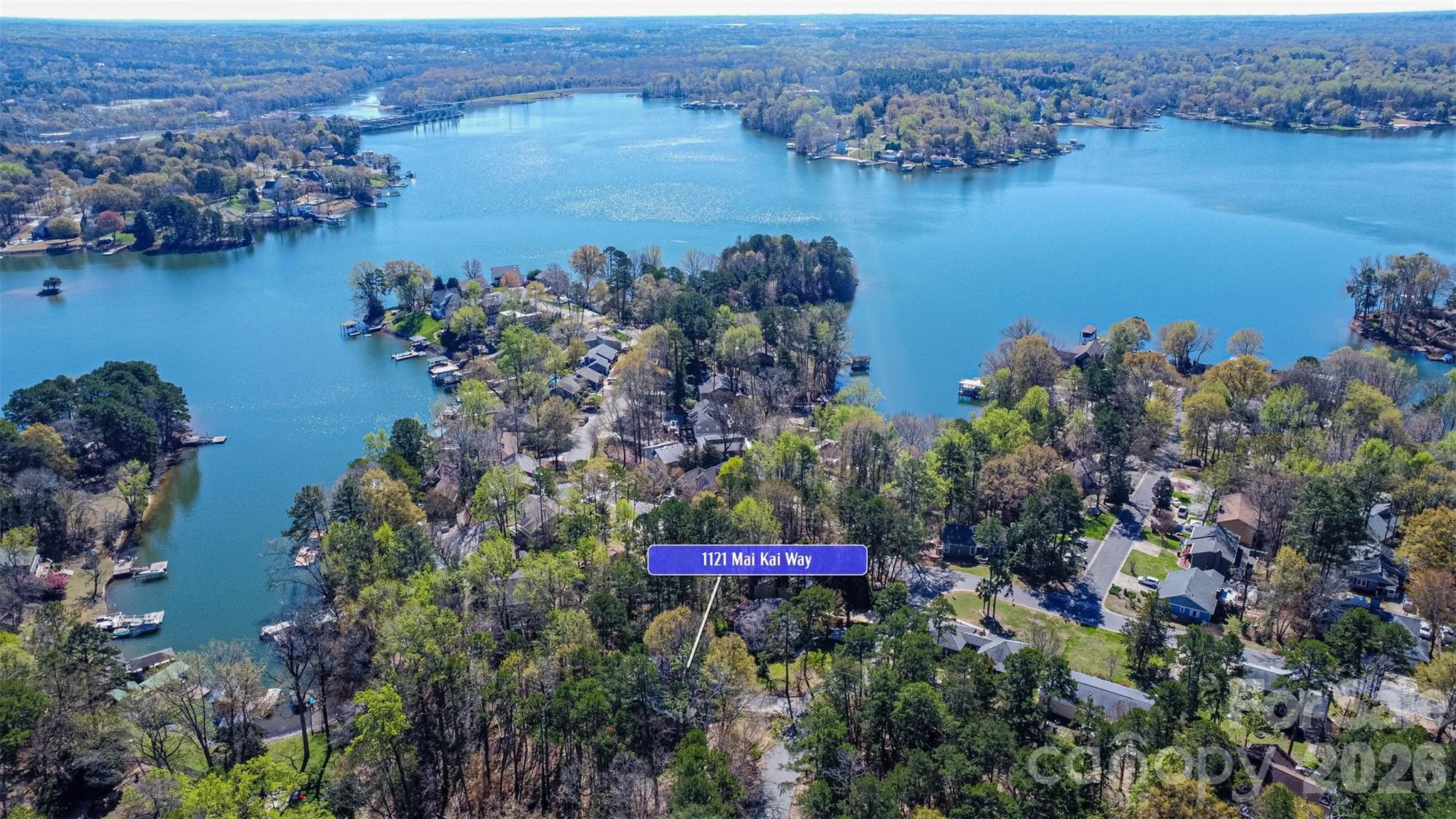 1121 Mai Kai Way Fort Mill, SC 29708 - Photo 2 of 35 an aerial view of a houses with a lake view