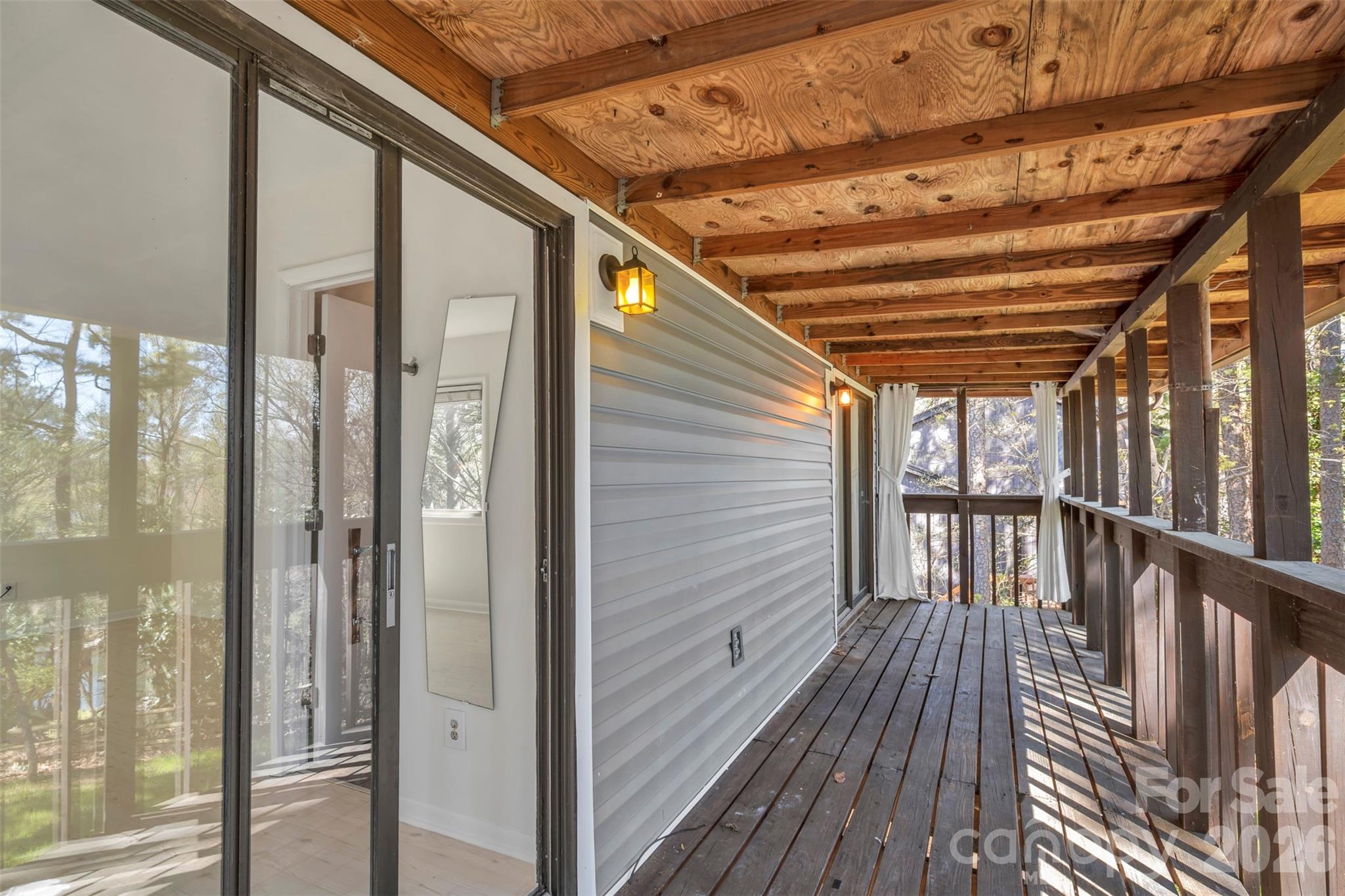 1121 Mai Kai Way Fort Mill, SC 29708 - Photo 27 of 35 a view of a balcony with wooden floor