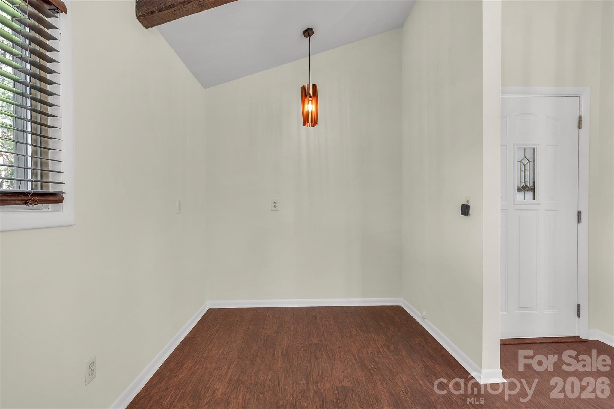 1121 Mai Kai Way Fort Mill, SC 29708 - Photo 7 of 35 an empty room with wooden floor and windows