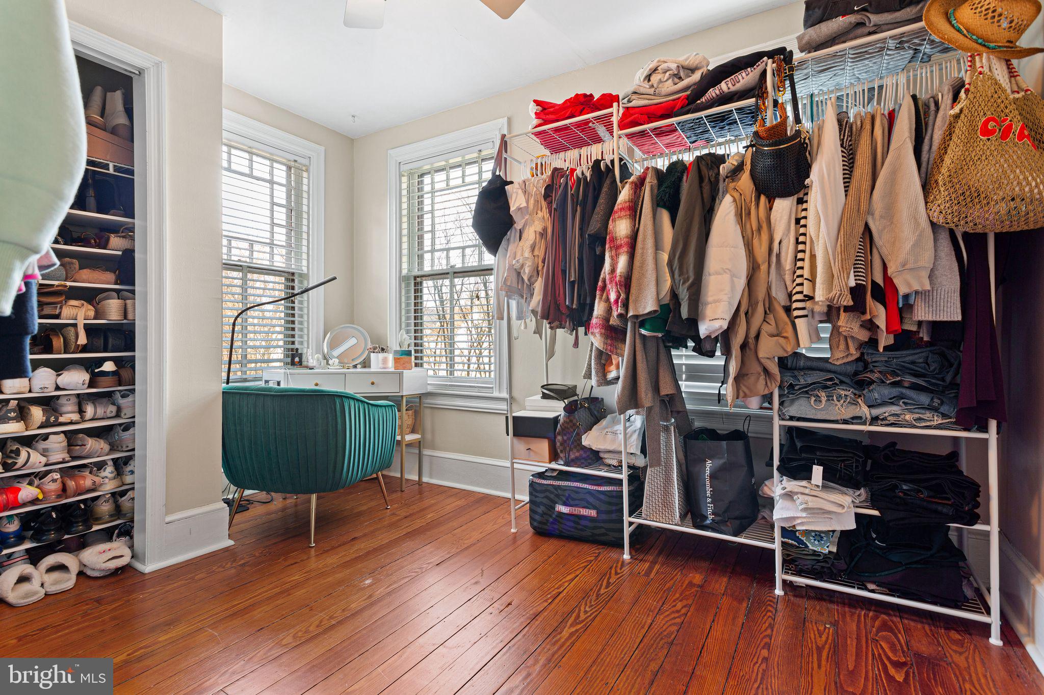 109 West Euclid Avenue Haddonfield, NJ 08033 - Photo 20 of 32 a view of walk in closet with clothes and shoes