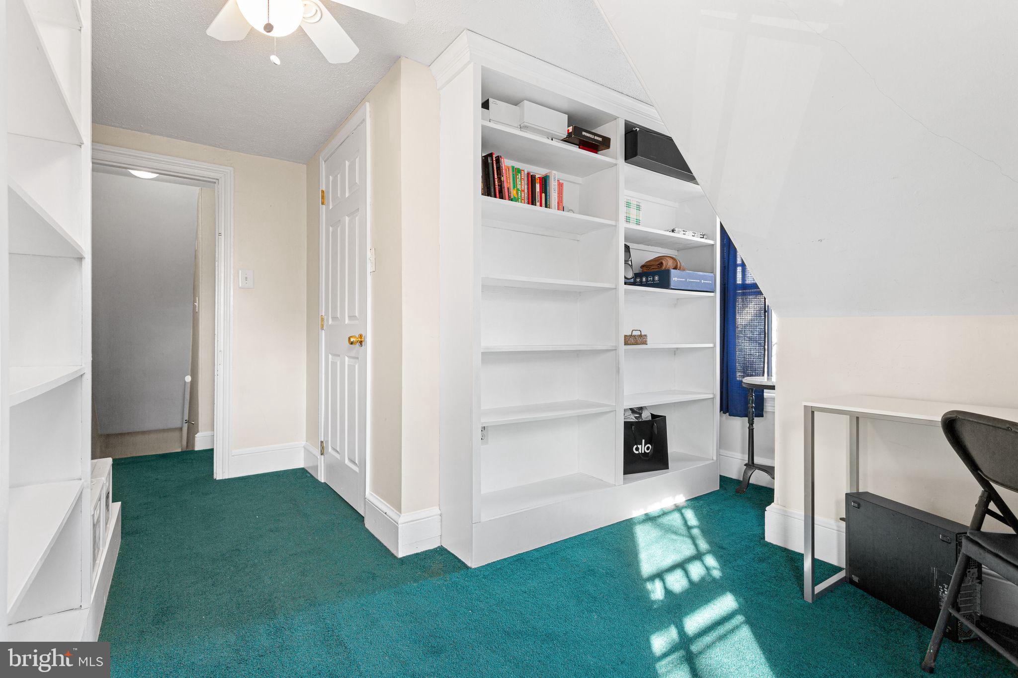 109 West Euclid Avenue Haddonfield, NJ 08033 - Photo 25 of 32 a living room with furniture and a book shelf