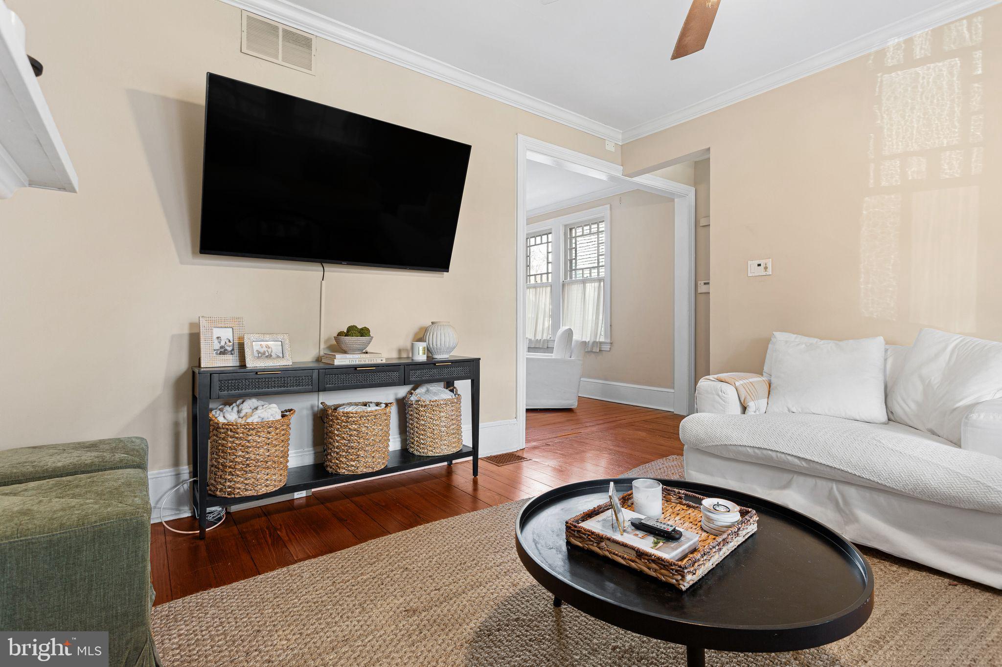 109 West Euclid Avenue Haddonfield, NJ 08033 - Photo 8 of 32 a living room with furniture and a flat screen tv