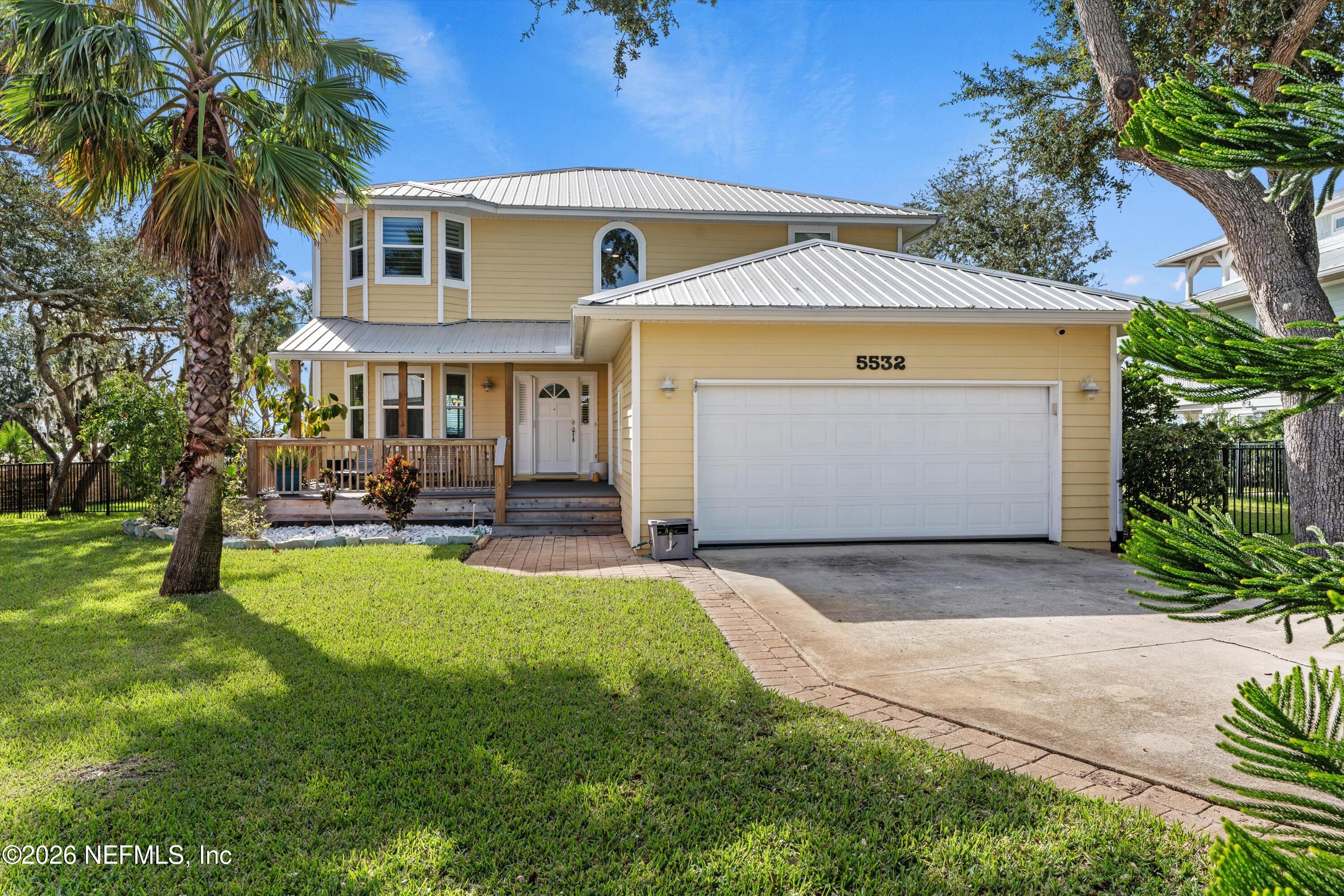 5532 Sunset Landing Circle St. Augustine, FL 32080 - Photo 13 of 43 a front view of a house with garden