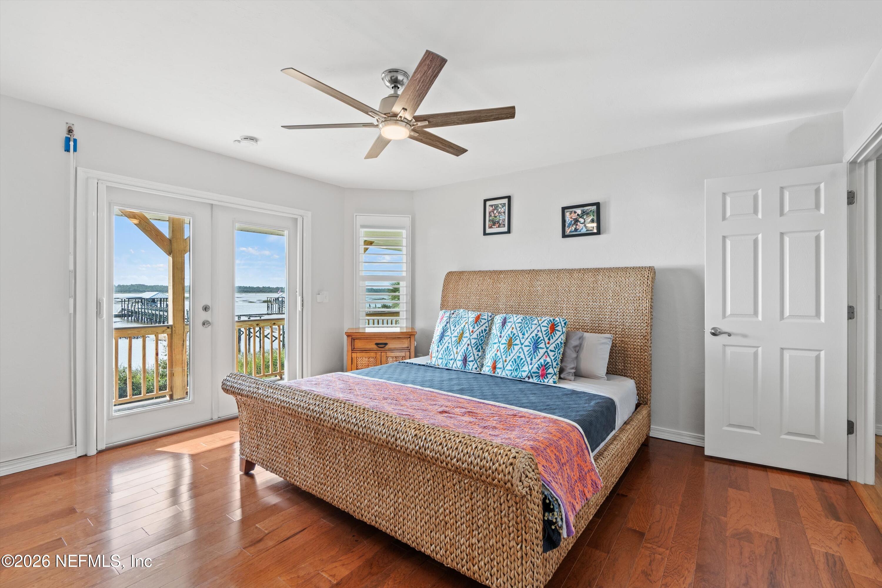 5532 Sunset Landing Circle St. Augustine, FL 32080 - Photo 16 of 43 a bedroom with a large bed and a window