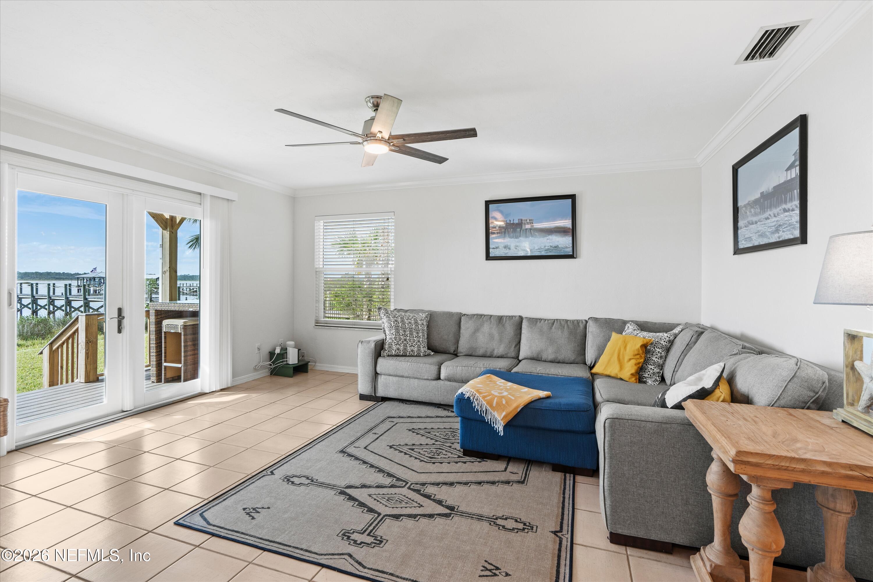5532 Sunset Landing Circle St. Augustine, FL 32080 - Photo 18 of 43 a living room with furniture and a rug
